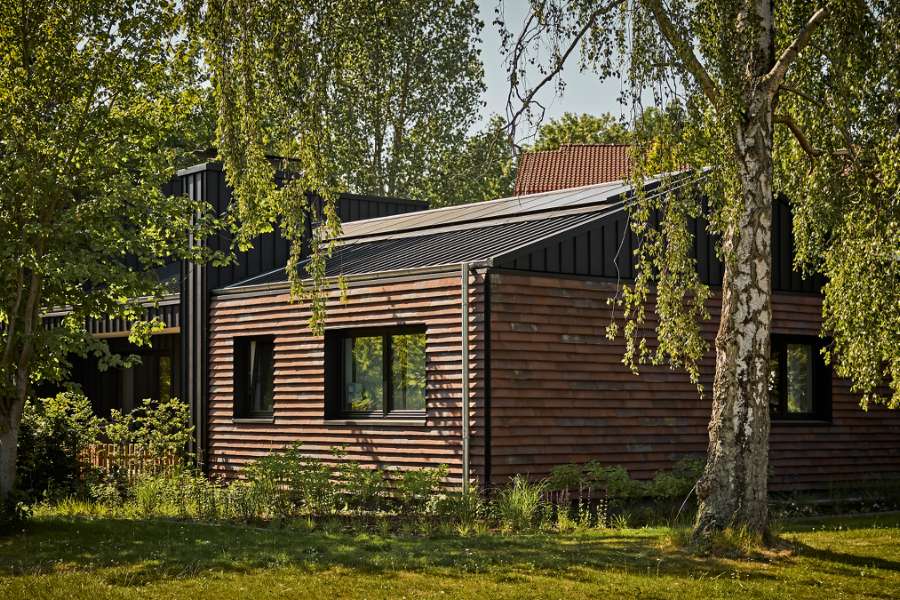 Architect pays attention to the details in a villa with a natural view and façade cladding in steel and stone, Konsul Lorenzen Straße 5, 24376 Kappeln, Germany